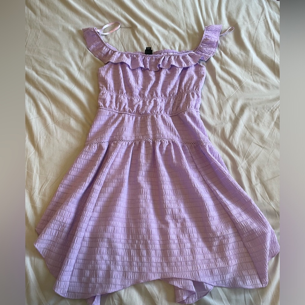 Small purple dress. Never worn. From target.